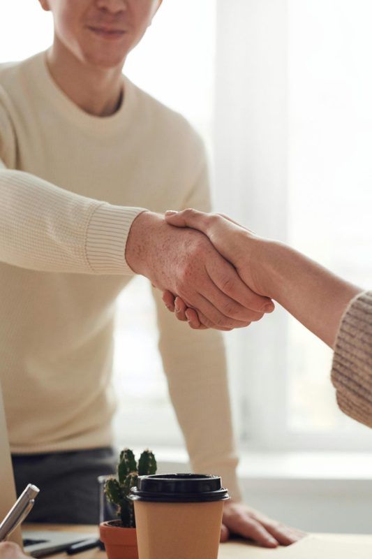 Man and Woman Near Table